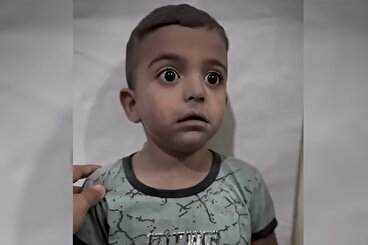 تصاویری دردناک از شوکه شدن کودک فلسطینی پس از حمله به بیمارستان غزه